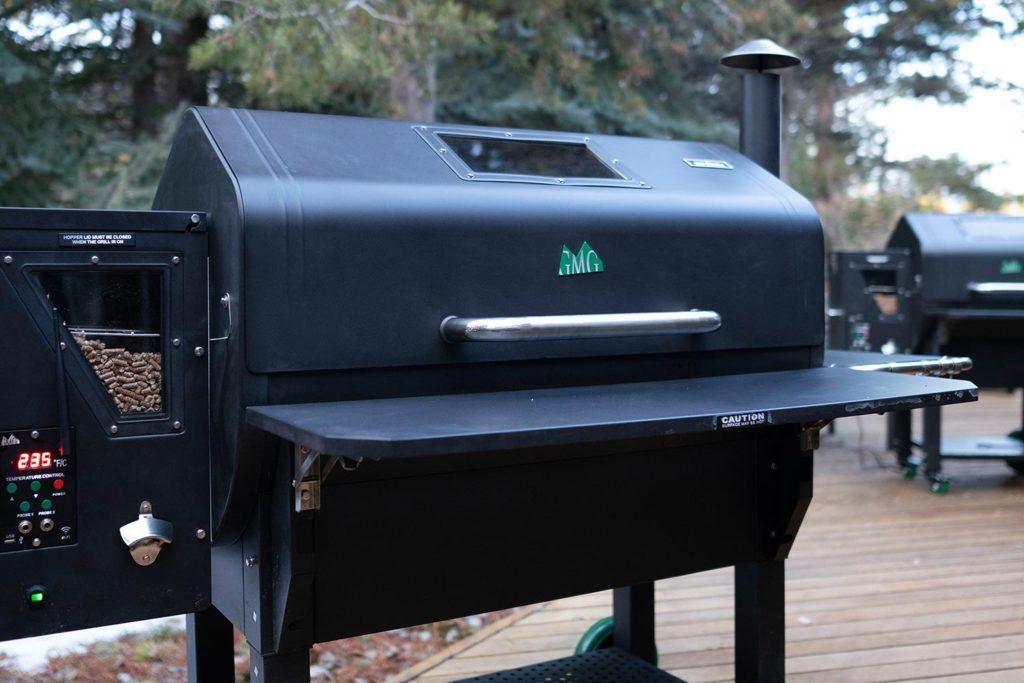 a smoker BBQ with wood pellet attachment